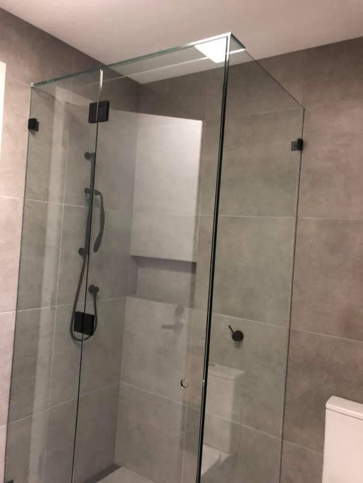 Modern frameless shower screens in a Wangaratta property